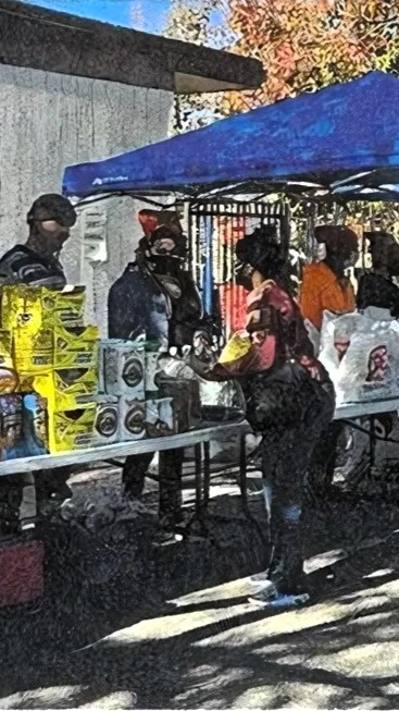 Community memebers in a food distribution site